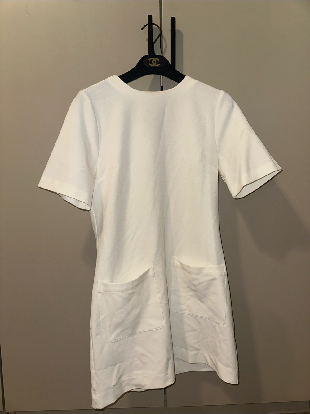 Reformation white front pocket mini dress size extra small
